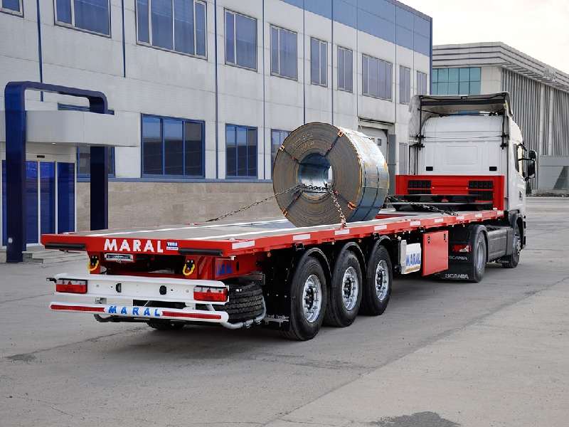 حمل بارهای صنعتی با تریلی کفی